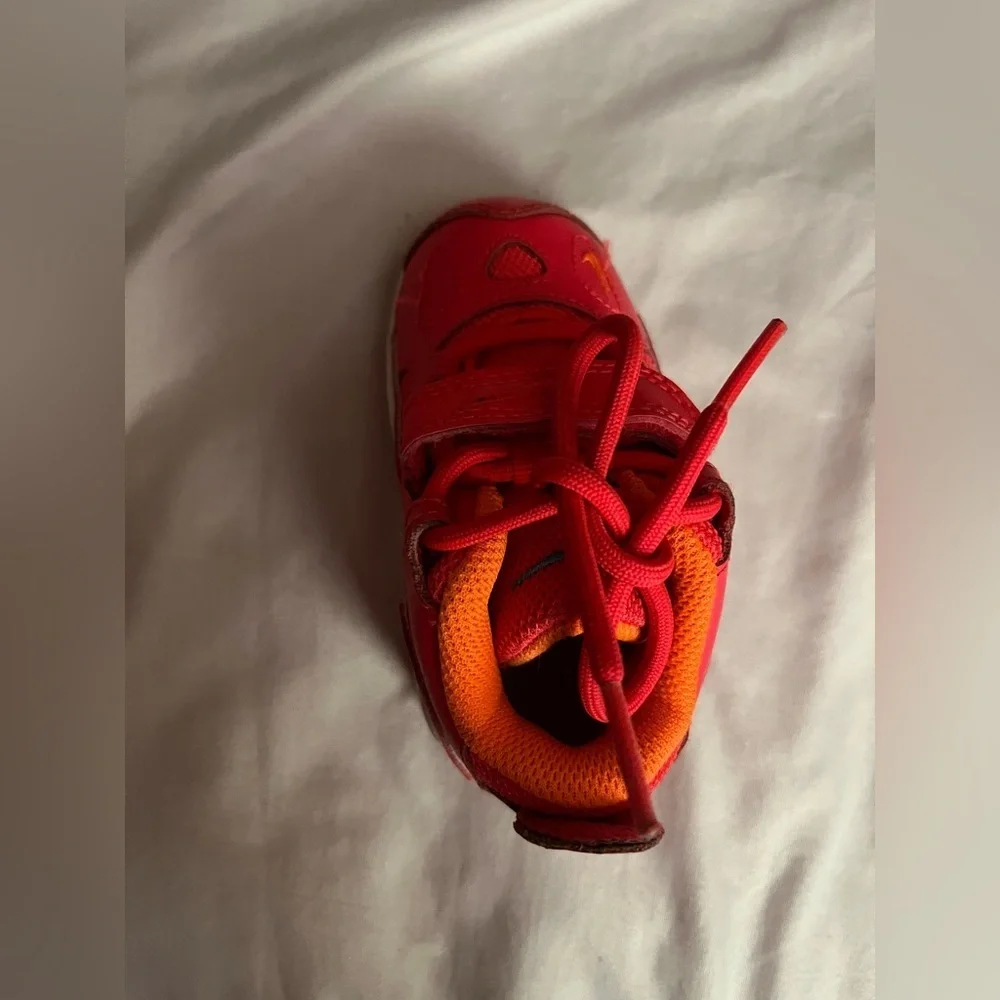 Nike Kids bright red and orange Sneakers